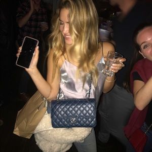 Silver shiny rag and bone going out top